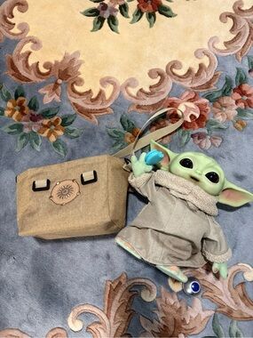 Grogu with carrying bag
